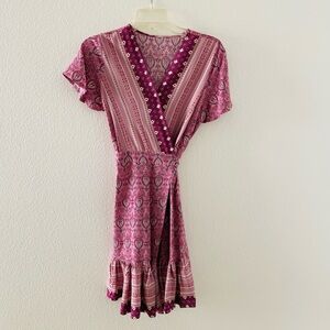 Summer wrap dress. Above the knee 36” shoulder to hem. V neck size small